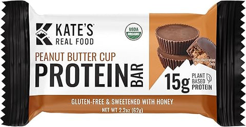 Kate's - Barras de Proteína Orgânicas Kate’s Real Food – (Peanut Butter Cup, 62g, Pacote com 12) – Barras de Proteína à Base de Plantas – Livre de Glúten, Soja, Não-OGM, Grãos Integrais e 100% Natural